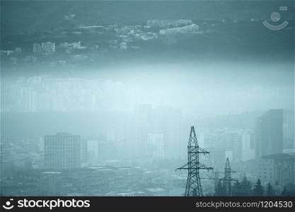 Densely polluted district. City in dense smog.