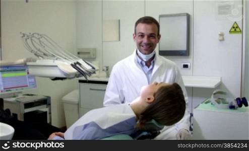 Dental care and hygiene, portrait of adult caucasian dentist at work and smiling at camera with customer sitting on exam chair. Sequence