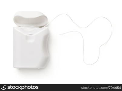 Dental floss container isolated on white background. Top view