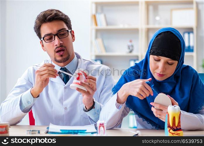 Dentist doctor and assistant working on new tooth implant