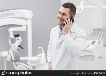 dentist making phone call