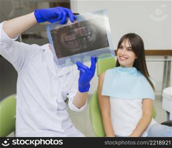 dentist woman looking radiography