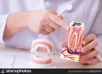 Dentist working teeth implant in medical lab