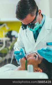 Dentist Working with Young Man