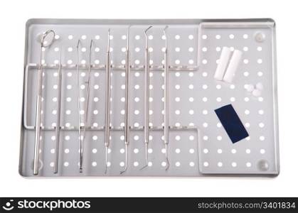 dentistry kit in a metal tray (surgery instruments, articulation paper, cotton rolls and wools)