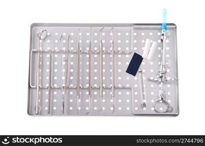 dentistry kit in a metal tray (surgery instruments, articulation paper, cotton rolls/wools, cartridge and syringe)