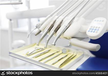 dentistry, medicine, medical equipment and stomatology concept - close up of dental instruments