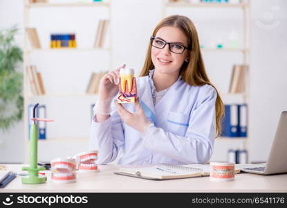 Dentistry student practicing skills in classroom