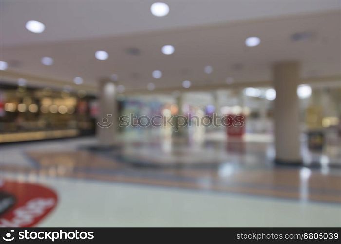department store for use as shopping concept, blur background with bokeh light