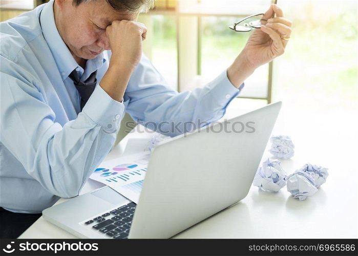 Depressed failure and tired businessman late sad and solving problem in office. in meeting room. stressed and worried at work crisis concept.