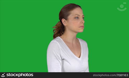 Depressed female stares into distance (Green Key)