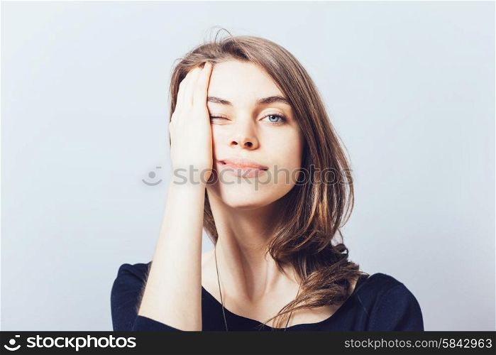 depressed girl on a gray background