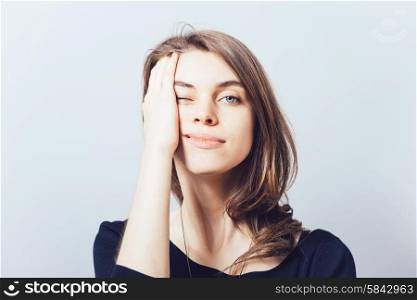 depressed girl on a gray background