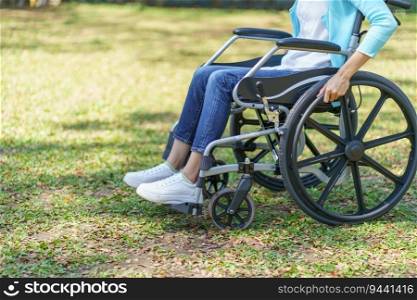 Depressed sad asian woman in wheelchair lonely disabled adult.