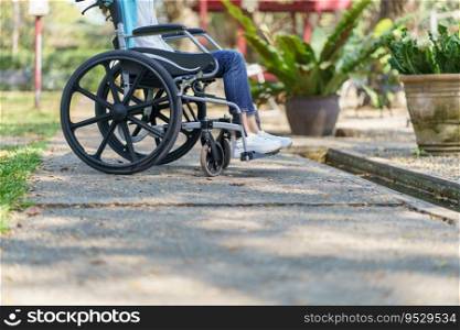 Depressed sad asian woman in wheelchair lonely disabled adult.