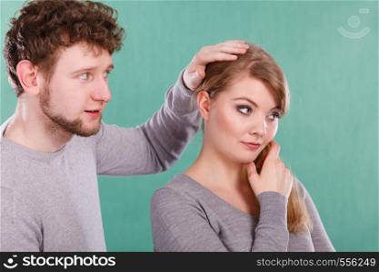 Depression and sadness concept. Unhappy depressed couple after argument. Sad woman and disappointed man standing together.. Sad depressed couple portrait.