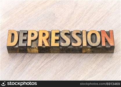 depression - word abstract in vintage letterpress wood type printing blocks