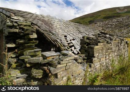Derelict stone building, collapsing roof, Snowdonia, Wales, United Kingdom