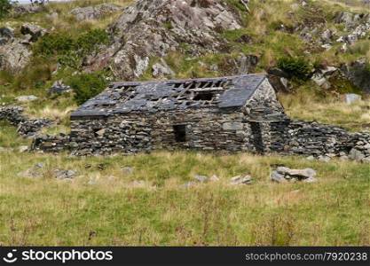 Derelict stone cottage or farmhouse, Snowdonia, Wales, United Kingdom