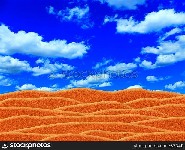 desert and blue sky above it. desert and blue cloudy sky above it