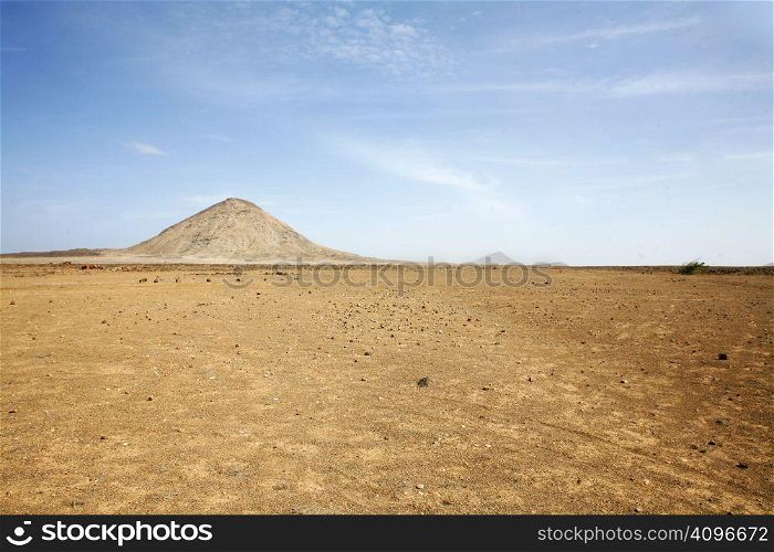 Desert landscape with several hills in the distance