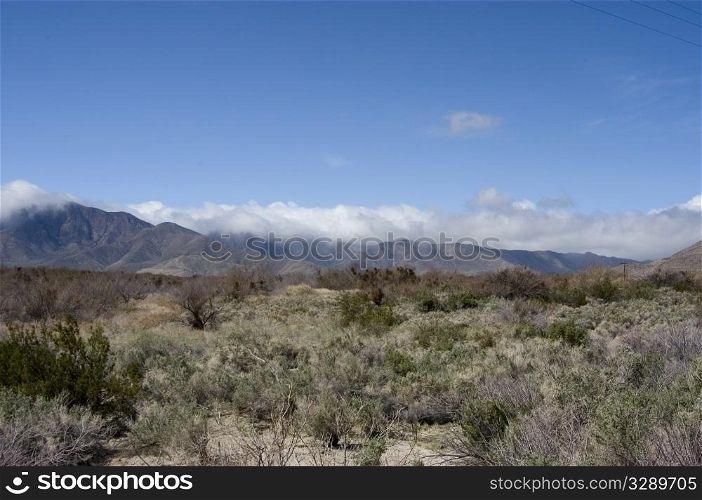 Desert landscape with storm approching
