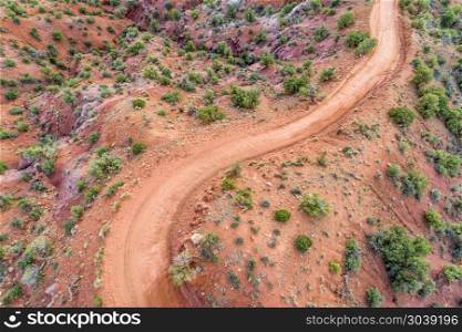desert road - aerial view. Aerial view of a desert road in the Moab area, Utah (Onion Creek Road)