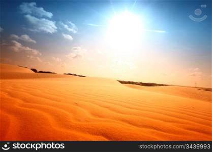 desert sand under blue sunny sky