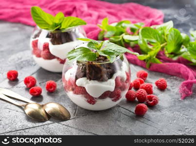 desert with yogurt and berries in the glass