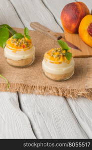 Desert with yogurt and passion fruit top on wooden table.