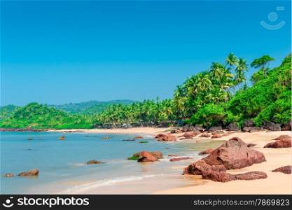 deserted tropical beach on a sunny day
