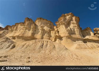 Desertic landscape of Erosion rocks, natural formations in Bolnuevo, Murcia, Spain.
