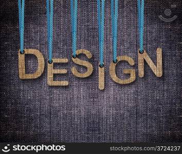 Design Letters hanging strings with blue sackcloth background.. Design
