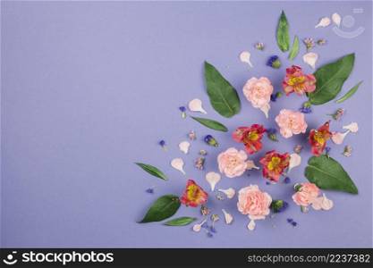 design made alstroemeria carnations leaves limonium flowers purple background