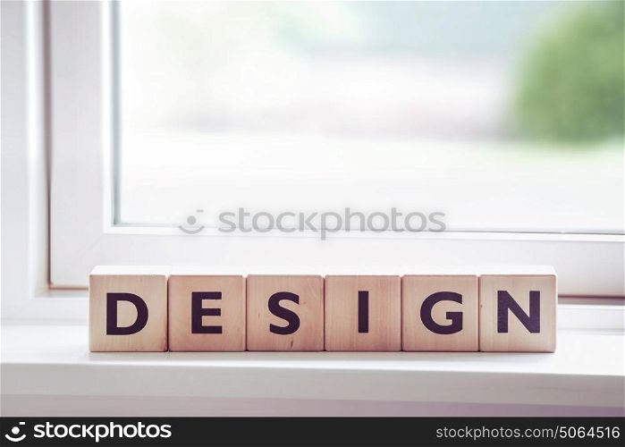 Design sign with letters made of wood