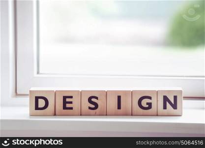 Design sign with letters made of wood