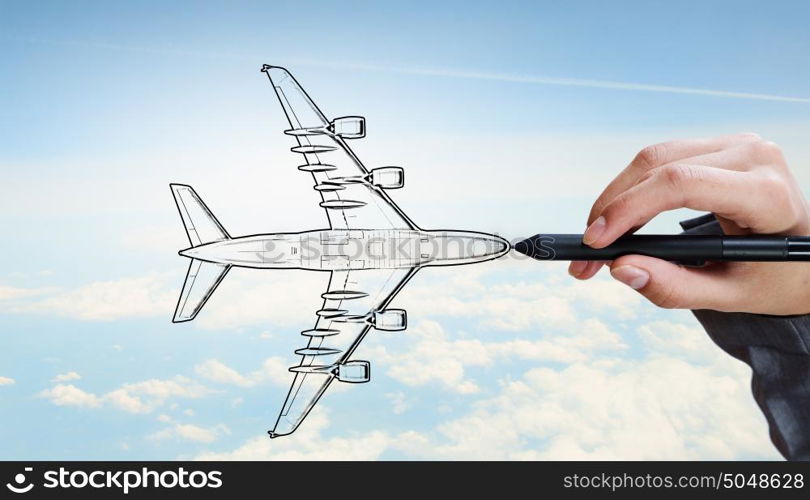 Designer draw airplane . Person drawing airplane model on sky background