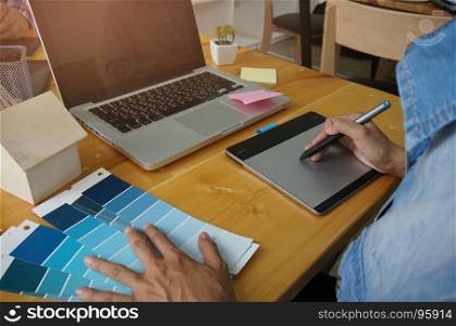 Designer graphic creative work tablet designing Creative Design Concept.