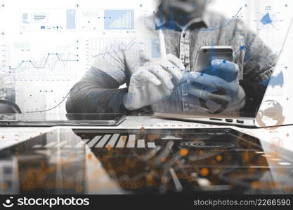 Designer hand working in creative studio. Using modern laptop digital tablet smart phone.responsive design website, black white,horizontal mock up photo