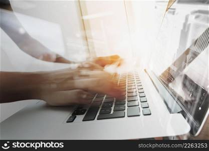designer moving hands working with laptop computer and digital web disign diagram as concept