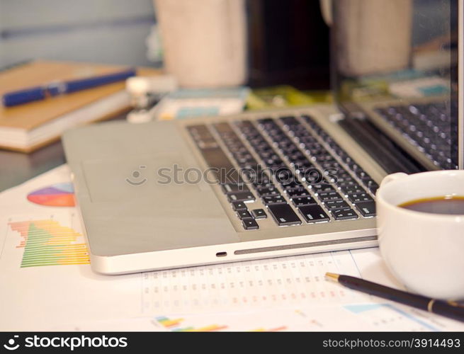 Desk cluttered with business documents.vintage effect style pictures