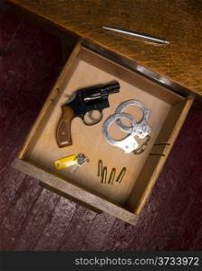 Desk Drawer Full of Self Defense Items Handcuffs Restraints Gun