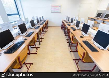 Desktop computers in computer lab on high school