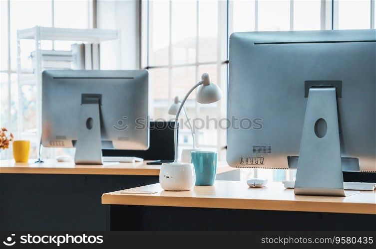 Desktop PC computers in small modern office or home office. Trendy workplace interior. Jivy. Desktop PC computers in small modern office or home office. Jivy