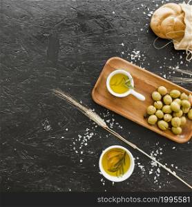 desktop with olives bread oil