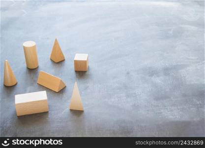 desktop with wooden geometrical shapes