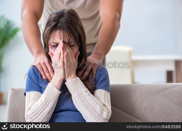 Desparate wife with aggressive husband in domestic violence conc. Desparate wife with aggressive husband in domestic violence concept. Desparate wife with aggressive husband in domestic violence conc