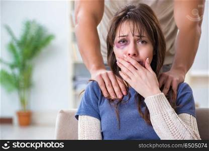 Desparate wife with aggressive husband in domestic violence conc. Desparate wife with aggressive husband in domestic violence concept. Desparate wife with aggressive husband in domestic violence conc