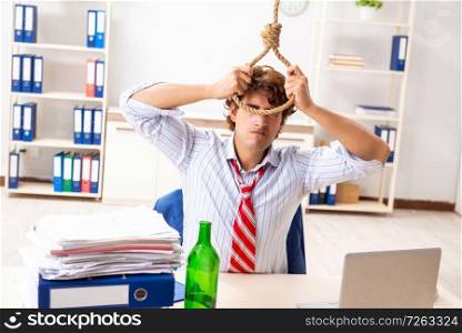 Desperate businessman thinking of committing suicide hanging. The desperate businessman thinking of committing suicide hanging