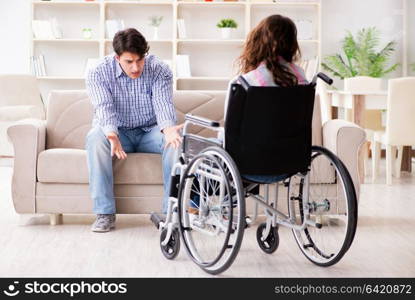 Desperate disabled person on wheelchair